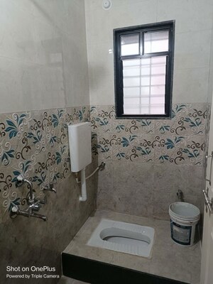 Bathroom in 1 BHK Apartment at LS Mehetre Laxmi Empire, Ravet – for Rent