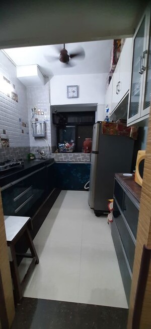 Kitchen in 1 BHK Apartment at Alica Nagar CHS, Kandivali East – for Sale