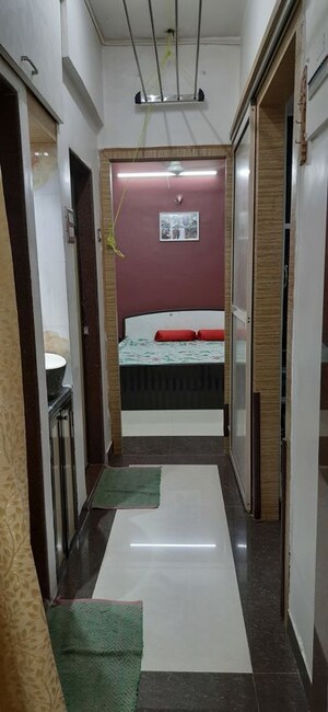 Bedroom in 1 BHK Apartment at Alica Nagar CHS, Kandivali East – for Sale
