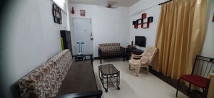 Living Room in 1 BHK Apartment at Alica Nagar CHS, Kandivali East – for Sale