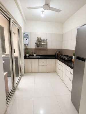 Kitchen in 2 BHK Apartment at Ravetkar Sanket, Kothrud – for Rent
