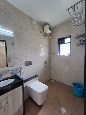 Bathroom in 3 BHK Apartment at Pashan Gaon – for Rent
