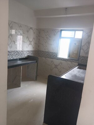 Kitchen in 3 BHK Apartment at DGS Sheetal Tapovan, Malad East – for Rent