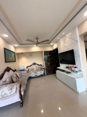 Living Room in 2 BHK Apartment at Man Opus, Mira Road – for Sale