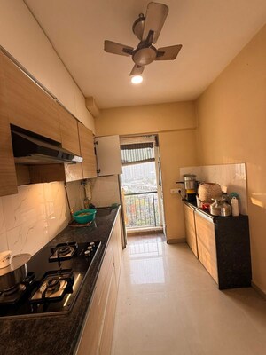 Kitchen in 2 BHK Apartment at Man Opus, Mira Road – for Sale