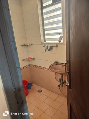 Bathroom in 1 BHK Apartment at Man Mandir CHS, Nerul Sector 19 – for Rent