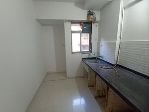 Kitchen in 1 BHK Apartment at Rosa Classic Apartment, Kasarvadavali – for Rent