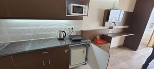 Kitchen in Studio Apartment at Paramount Golfforeste, Zeta I Greater Noida – for Rent