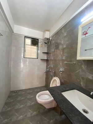 Bathroom in 2.5 BHK Apartment at Deshpande Shikshak CHS, Sanewadi – for Rent