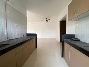 Kitchen in 2.5 BHK Apartment at Deshpande Shikshak CHS, Sanewadi – for Rent