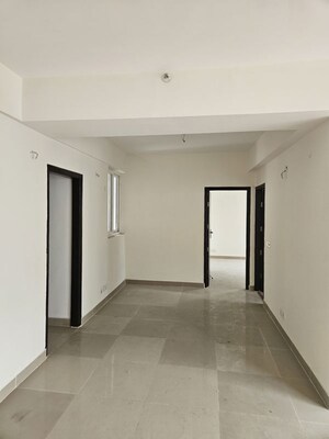 Building Lobby in 2 BHK Apartment at Ramprastha Skyz, Sector 37d – for Rent