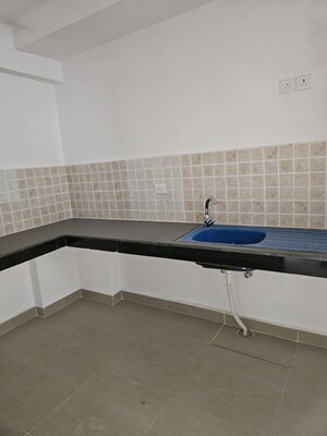 Kitchen in 2 BHK Apartment at Ramprastha Skyz, Sector 37d – for Rent