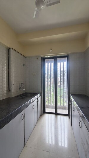 Kitchen in 2 BHK Apartment at Eco Residency Andheri, Andheri East – for Sale