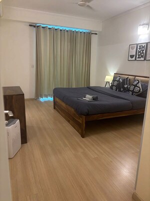 Bedroom in 3.5 BHK Apartment at DLF Park Place, Sector 54 – for Rent