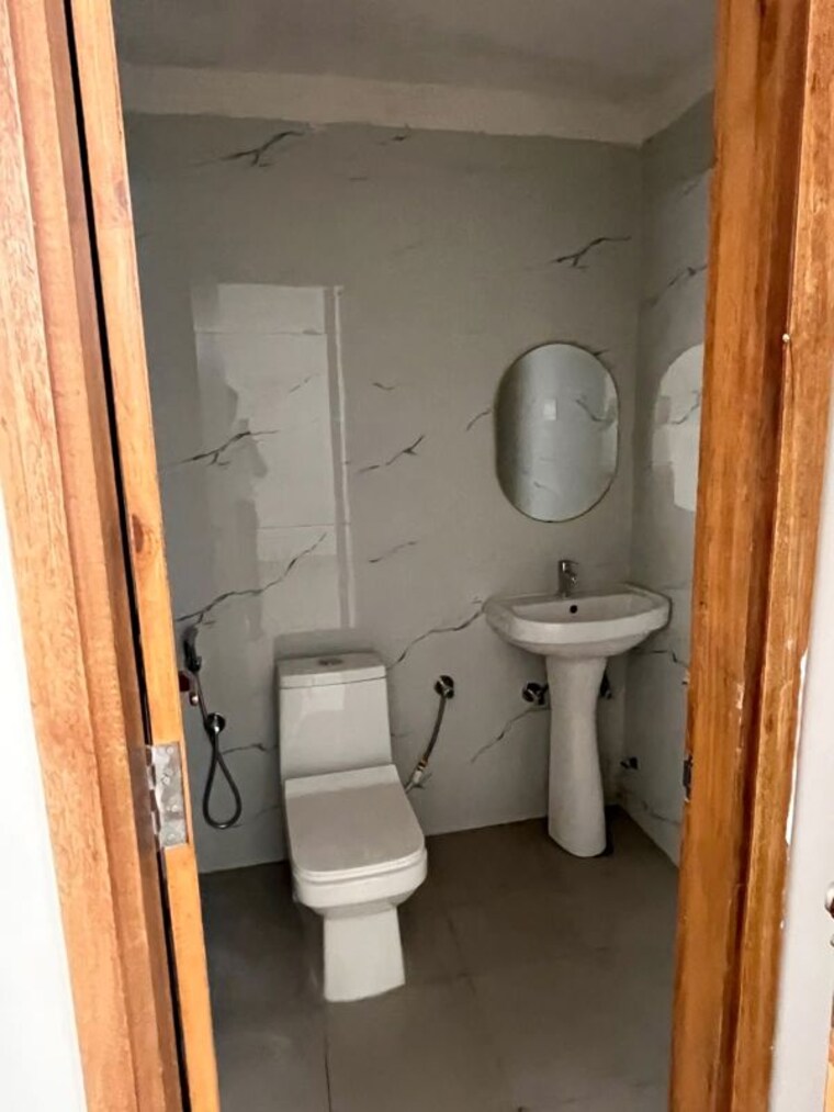 Bathroom, earth-titanium-city Studio 650 Sq.Ft. Apartment In Tech Zone Greater Noida Greater Noida 10678519