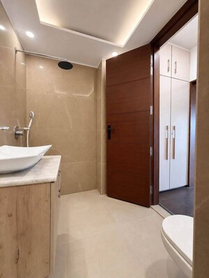 Bathroom in 3 BHK Builder Floor at Ansal Sushant Apartments, Sushant Lok I – for Rent