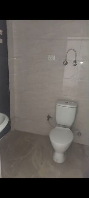 Bathroom in 2 BHK Apartment at Uninav Heights Phase I, Raj Nagar Extension – for Rent