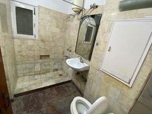 Bathroom in 3 BHK Apartment at Sarita Vihar – for Sale