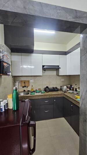 Kitchen in 1 RK Apartment at Logix Blossom Zest, Sector 143 – for Rent