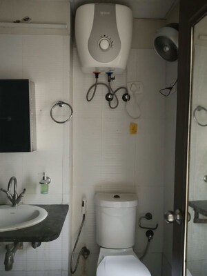 Bathroom in 2 BHK Apartment at Mahagun Moderne, Sector 78 – for Rent