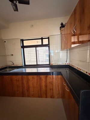 Kitchen in 2 BHK Apartment at KVC Prathampad Apartment, Malad West – for Sale