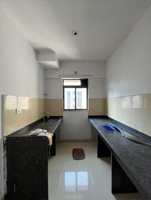 Kitchen in 1 BHK Apartment at Lodha Palava Aurelia, Dombivli East – for Rent