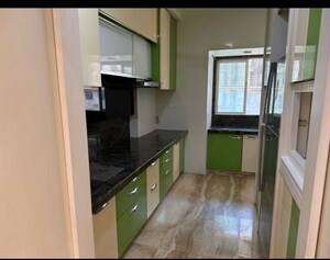 Kitchen in 3 BHK Apartment at Giriraj CHS Naupda, Naupada – for Rent
