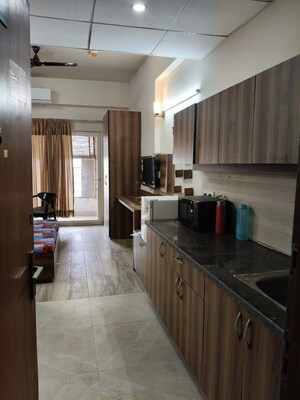 Kitchen in Studio Apartment at Paramount Golfforeste, Zeta I Greater Noida – for Rent