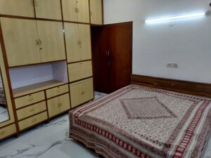 Bedroom in 3 BHK Builder Floor at Nehru Enclave – for Rent