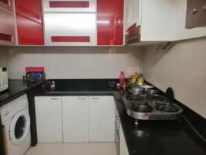 Kitchen in 2 BHK Apartment at Group Satellite Elegance, Goregaon East – for Rent