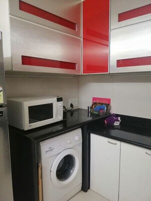 Kitchen in 2 BHK Apartment at Group Satellite Elegance, Goregaon East – for Rent