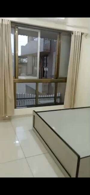 Bedroom in 2 BHK Apartment at Chandak 34 Park Estate, Goregaon West – for Rent
