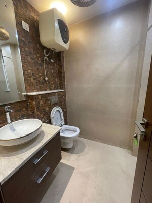 Bathroom in 3 BHK Builder Floor at Sushant Lok I – for Rent