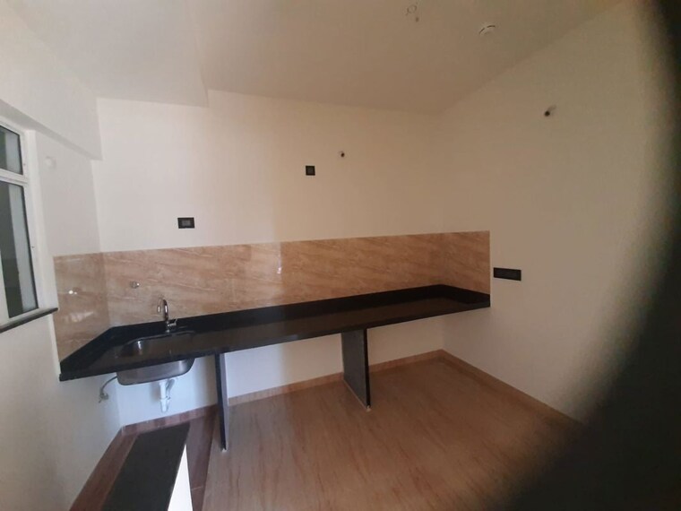 Kitchen, vtp-cygnus 2 Bedroom 671 Sq.Ft. Apartment In Kharadi Pune 10679137