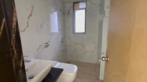 Bathroom in 4 BHK Apartment at Matunga East – for Sale