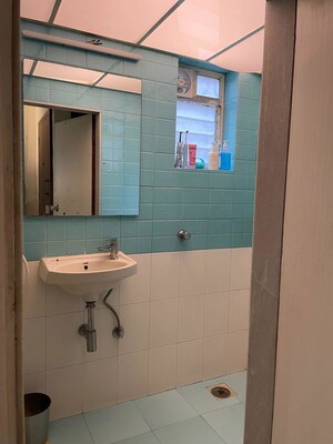 Bathroom in 1 BHK Apartment at Sea Shell CHS, Juhu – for Rent