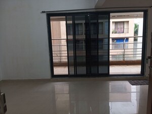 Living Room in 2 BHK Apartment at Dream Shubhamkaroti CHS, Bhaskar Colony – for Sale