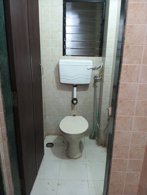 Bathroom in 2 BHK Apartment at Dream Shubhamkaroti CHS, Bhaskar Colony – for Sale