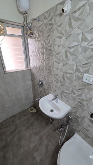 Bathroom in 1 BHK Apartment at Raunak Tulip, Vartak Nagar – for Rent
