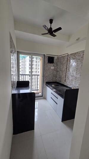 Kitchen in 1 BHK Apartment at Raunak Tulip, Vartak Nagar – for Rent