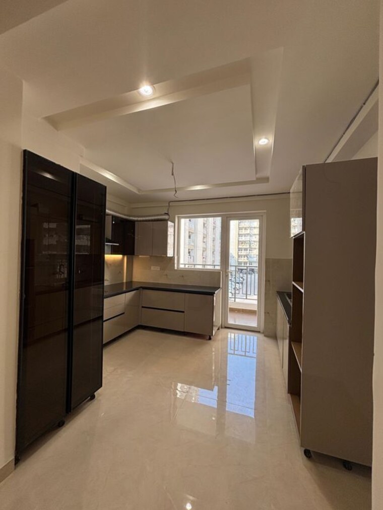 Kitchen, alaknanda-maxxus-eden-estate 3 Bedroom 2197 Sq.Ft. Apartment In Ghazipur Zirakpur 10679187