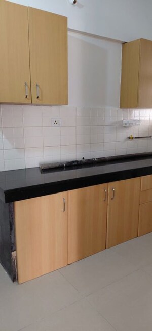 Kitchen in 3 BHK Apartment at Nagpal Dev Exotica, Kharadi – for Rent