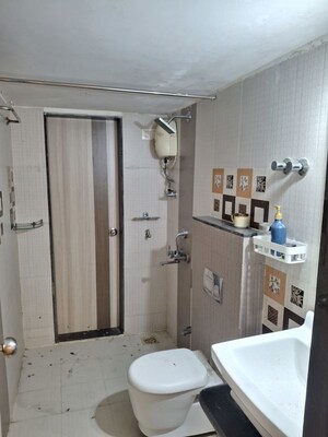Bathroom in 3 BHK Apartment at Jangid Galaxy, Ghodbunder Road – for Rent