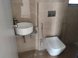Bathroom in 2 BHK Apartment at Dhamji Shamji Mahavir Spring Tulip Phase 1, Pokhran Road No Two – for Rent