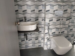 Bathroom in 2 BHK Apartment at Dhamji Shamji Mahavir Spring Tulip Phase 1, Pokhran Road No Two – for Rent