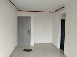 Building Lobby in 2 BHK Apartment at Dhamji Shamji Mahavir Spring Tulip Phase 1, Pokhran Road No Two – for Rent