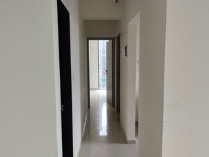 Building Lobby in 2 BHK Apartment at Dhamji Shamji Mahavir Spring Tulip Phase 1, Pokhran Road No Two – for Rent