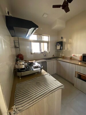 Kitchen in 2 BHK Apartment at Hiranandani Estate Rodas Enclave, Ghodbunder Road – for Sale