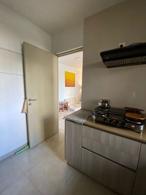 Kitchen in 2 BHK Apartment at Hiranandani Estate Rodas Enclave, Ghodbunder Road – for Sale