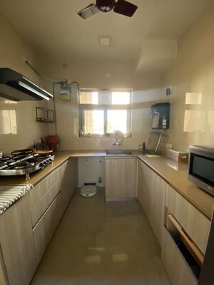 Kitchen in 2 BHK Apartment at Hiranandani Estate Rodas Enclave, Ghodbunder Road – for Sale